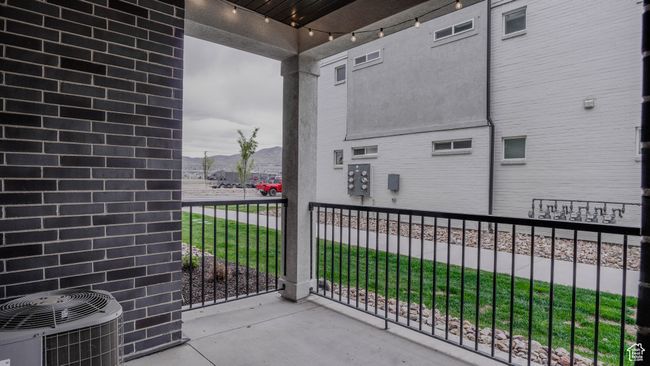 Balcony featuring central AC unit and a mountain view | Image 27
