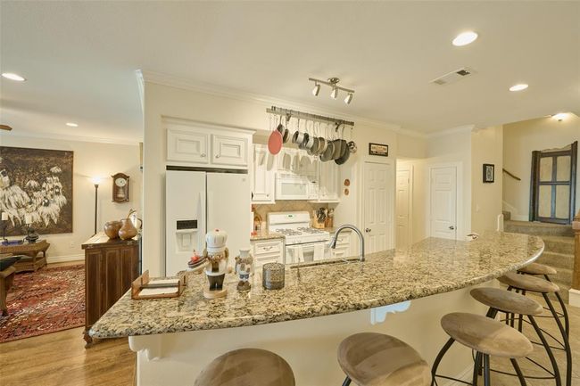 This Expansive Kitchen Island w/Seating Offers a Perfect Space for Casual Dining & Entertaining. | Image 4