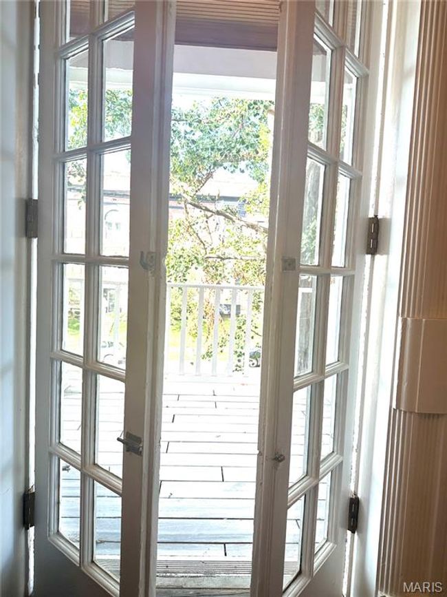 Doorway to outside with healthy amount of natural light | Image 11