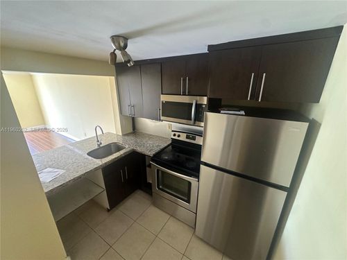 311-496 Nw 165th Street Rd, Miami, FL, 33169-6466 | Card Image
