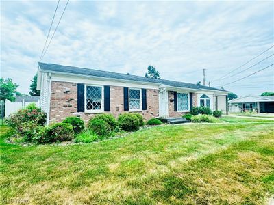 SIDE VIEW OF HOME SITTING ON CORNER LOT | Image 2