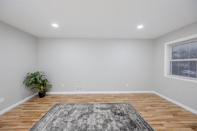 Empty room with hardwood / wood-style floors | Image 11