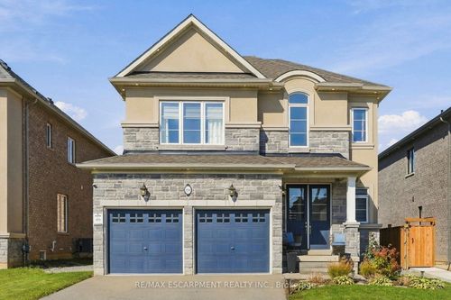 193 Whittington Drive, House with 4 bedrooms, 3 bathrooms and 2 parking in Hamilton ON | Card Image