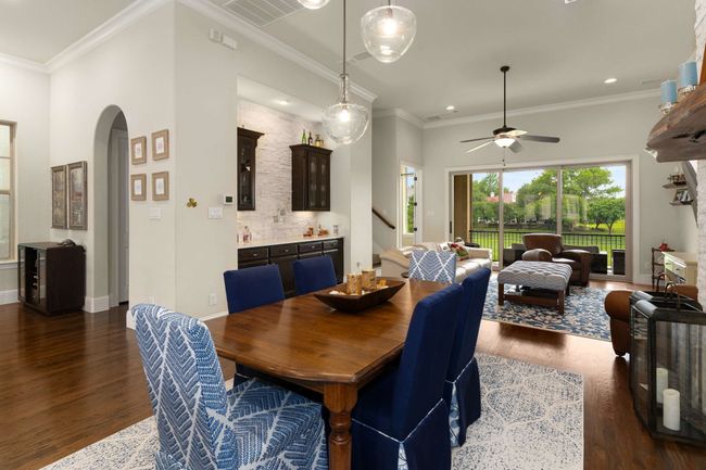 Dining room situated for entertaining or taking in the view. | Image 9