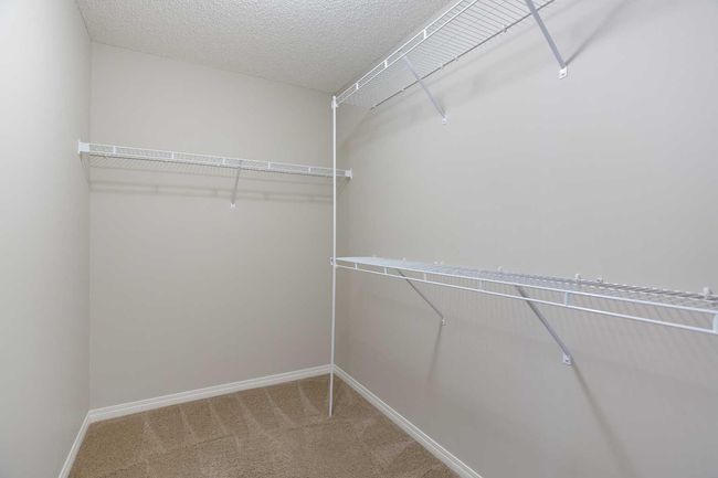 32 Drake Landing Hill, House other with 3 bedrooms, 3 bathrooms and 4 parking in Okotoks AB | Image 28