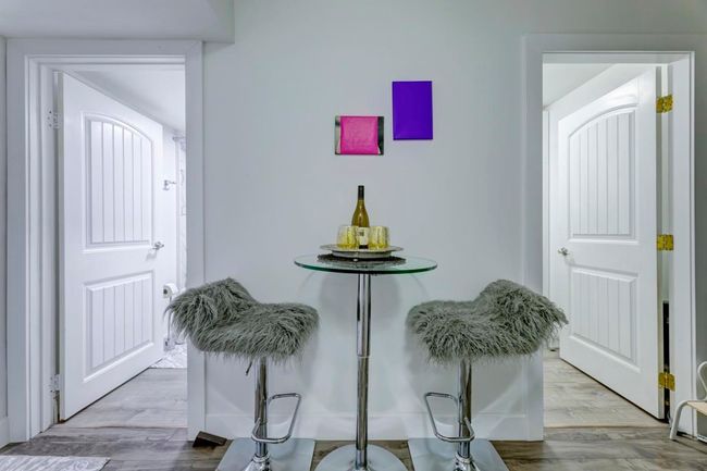 Dining room with light wood-style flooring | Image 16