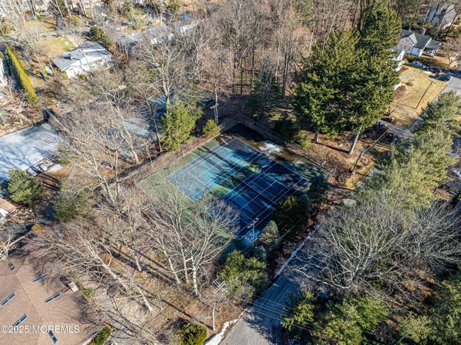 Pines Lake in Wayne, New Jersey, is a private lakeside community that offers a harmonious blend of natural beauty and modern amenities. Established in 1927, this serene enclave is centered around a picturesque man-made lake, providing residents with year-round recreational opportunities. | Image 58