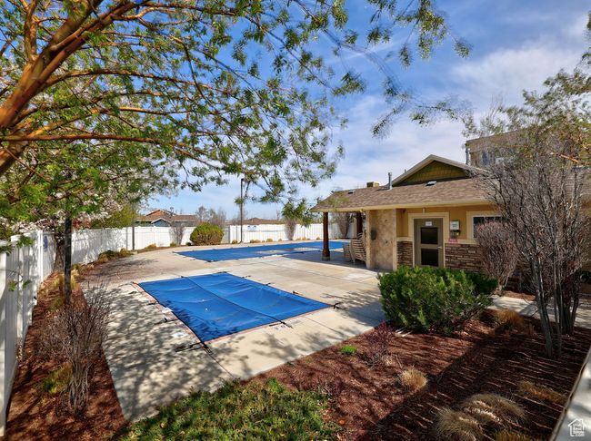 View of pool featuring a fenced backyard, a fenced in pool, and a patio area | Image 31