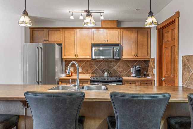 306 - 170 Crossbow Place, Home with 2 bedrooms, 2 bathrooms and 2 parking in Canmore AB | Image 6