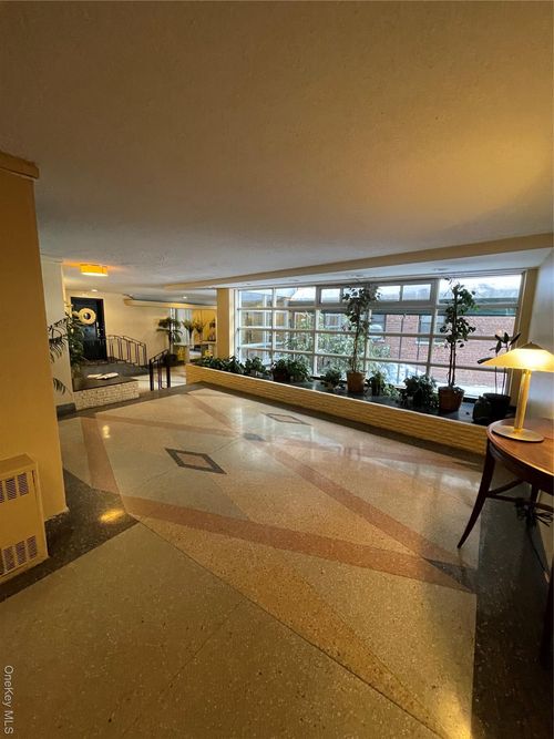 2-i-118-60 Metropolitan Ave, Kew Gardens, NY, 11415-2029 | Card Image