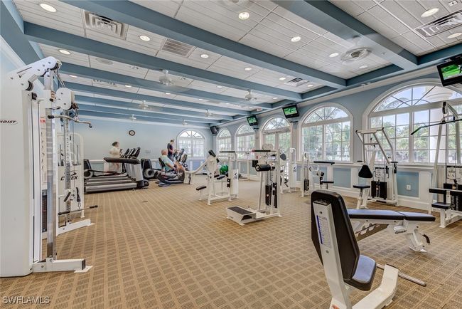 Exercise room featuring visible vents, recessed lighting, carpet flooring, and a healthy amount of sunlight | Image 37