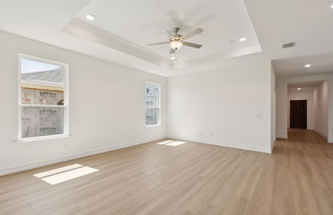 Gathering room drenched in natural light, creating a warm atmosphere *Real home pictured | Image 10