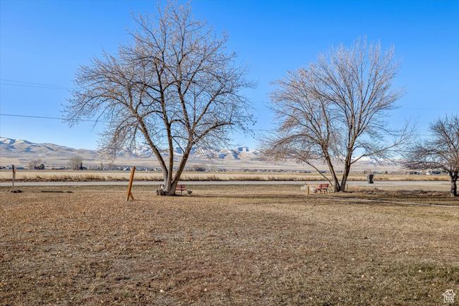 View of yard featuring a mountain view and a rural view | Image 35