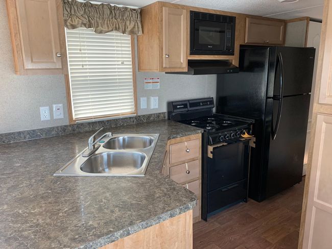 2021 Summit Park Model on beautiful large unit on "Playground Circle" in Cokato Lake RV Resort. Includes custom sun room, shed and more! | Image 5
