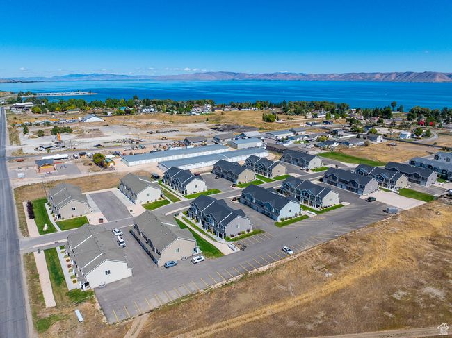 Drone / aerial view featuring a water and mountain view | Image 24