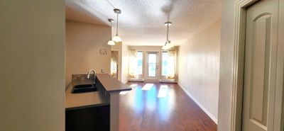 407 - 3101 34 Ave Nw, Condo with 1 bedrooms, 1 bathrooms and 1 parking in Calgary AB | Image 3