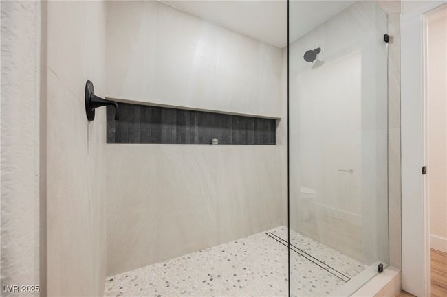 Gorgeous walk-in primary suite shower! | Image 32