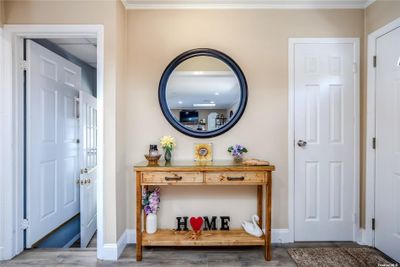 Inviting Foyer with OSE to side yard and basement | Image 3