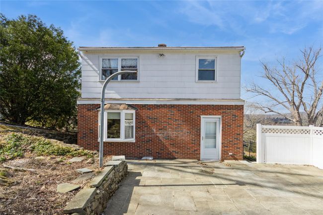 Patio is off the kitchen. | Image 24