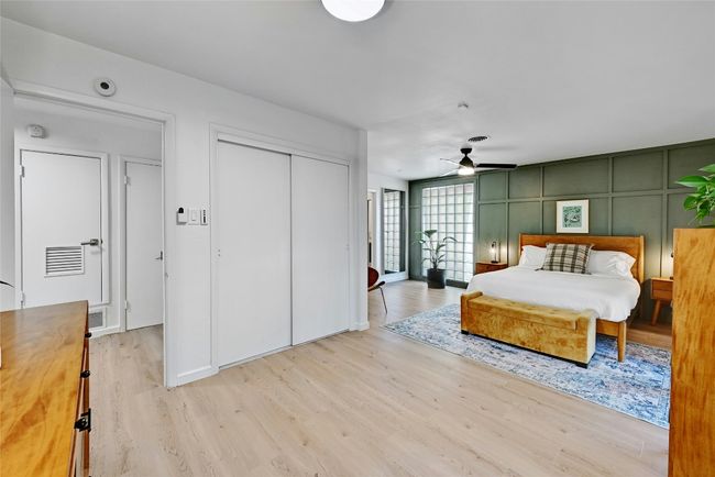 This angle displays the closet space and modern ceiling fan. | Image 17