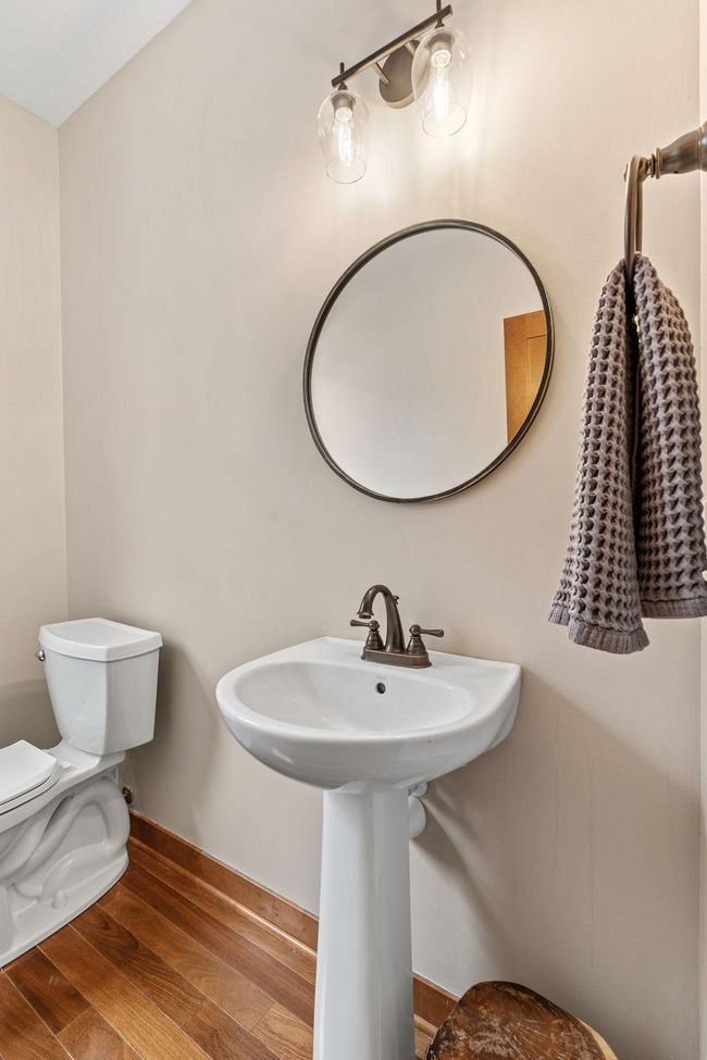 Conveniently located main level powder room. | Image 24