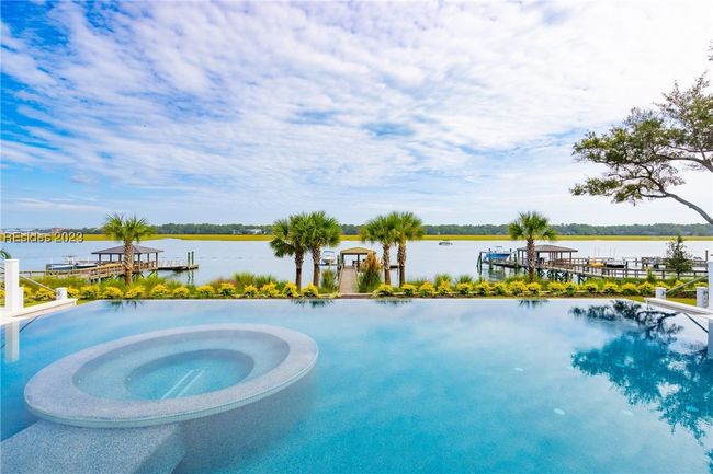 Salt water zero edge aqua blue infinity pool | Image 4