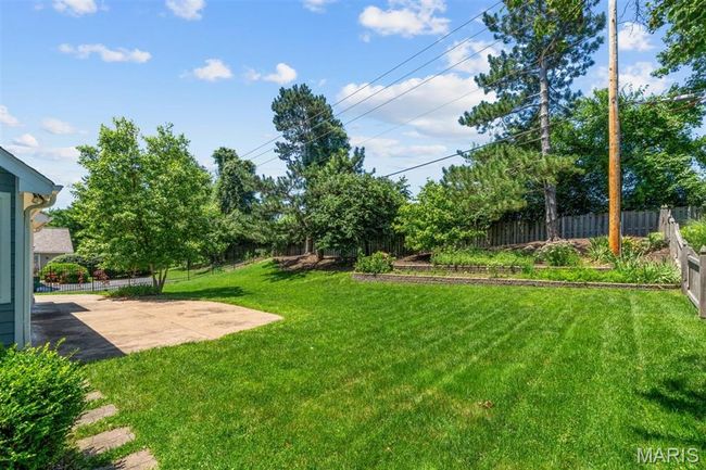 View of yard featuring a patio | Image 61