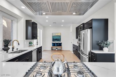 Gorgeous kitchen features all new appliances and fixtures. | Image 3