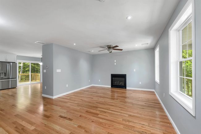 Cozy Fireplace, HW floors, Lighting and Sunlit! | Image 8