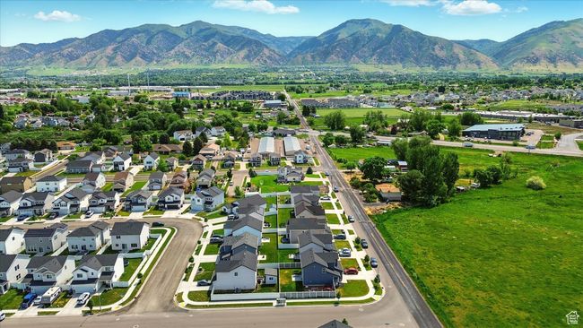 Aerial perspective of suburban area featuring a mountain backdrop | Image 30