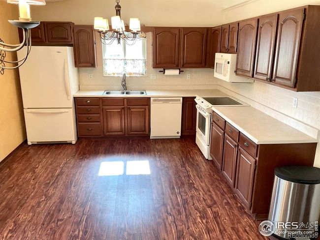 Kitchen With Lots Of Sunlight and Refinished Cabinets | Image 5