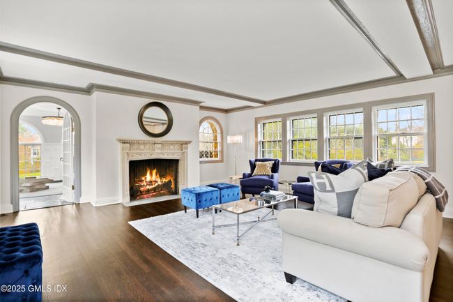 Living Room with Fireplace to Solarium | Image 8