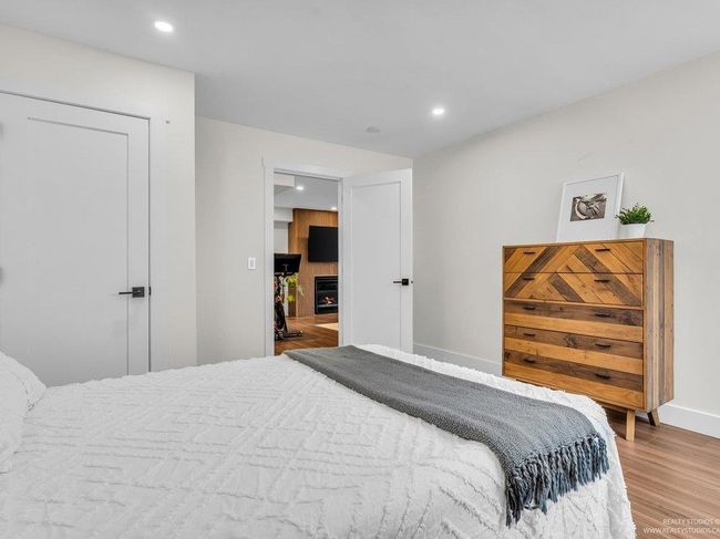 Spacious Bedroom #5 in this beautifully renovated house! Another bedroom with new closet systems, new floors, new south facing window, and new doors! | Image 35