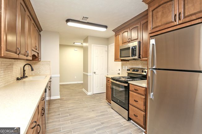 2045 Amberly Glen Way, House other with 3 bedrooms, 2 bathrooms and null parking in Dacula GA | Image 5