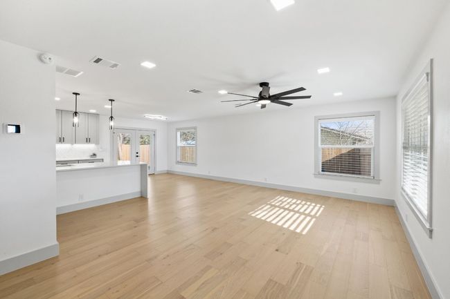 The kitchen/living/breakfast room open concept floor plan is perfect for staying connected with everyone in your home and is also great for entertaining your guest. | Image 5