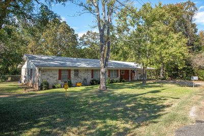 Ranch-style home featuring a front lawn | Image 2