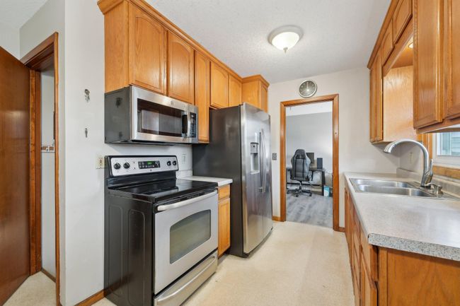 11749 Crooked Lake Blvd Nw, House other with 4 bedrooms, 1 bathrooms and null parking in Coon Rapids MN | Image 10