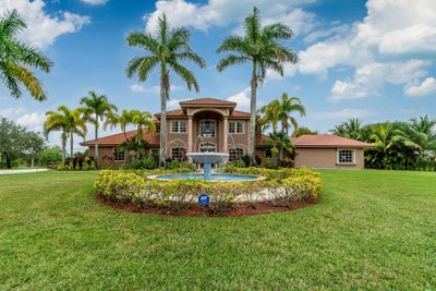 5660 Lago Del Sol Drive, House other with 6 bedrooms, 4 bathrooms and null parking in Lake Worth FL | Image 1