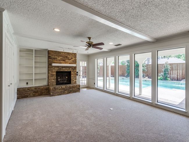 Family room with awesome view of the backyard pool. | Image 11