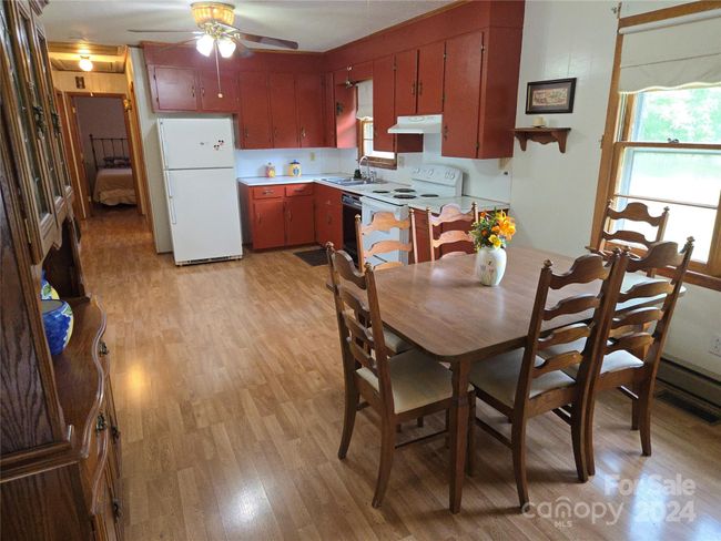 View from Bonus Room through kitchen to hallway | Image 8