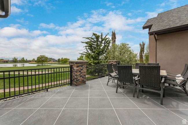 View of patio / terrace featuring outdoor dining area and a water view | Image 28