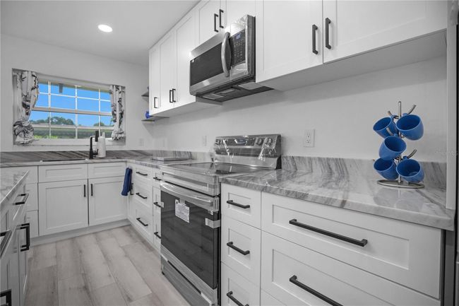 APT-33E - 1701 Pinehurst Rd, Condo with 2 bedrooms, 2 bathrooms and null parking in DUNEDIN FL | Image 9