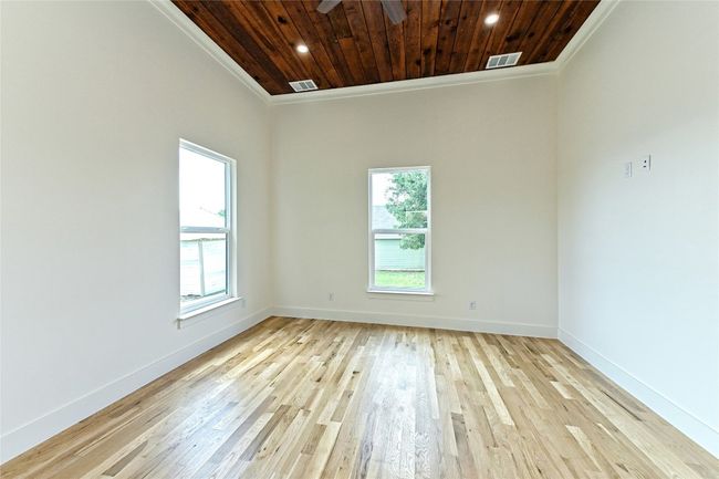 Master Bedroom with crown molding, wooden ceiling, ceiling fan, light wood-style flooring, and recessed lighting | Image 29