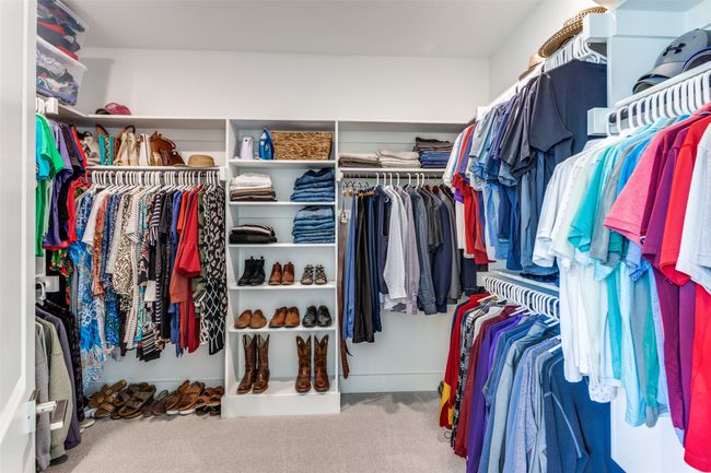 Walk in closet featuring carpet flooring | Image 24