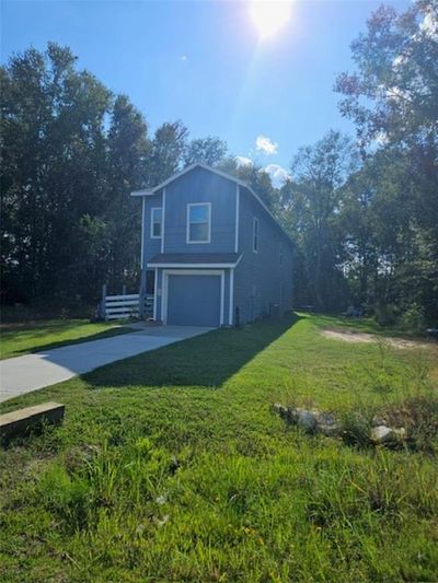 view of the front of the home on a large lot | Image 3