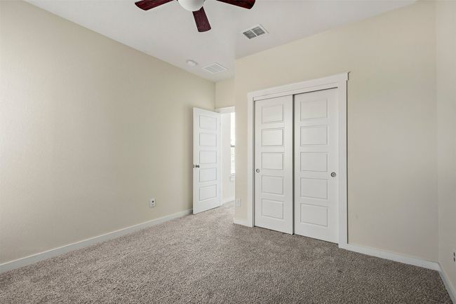 Positioned for privacy, the guest bedrooms provide a quiet, restful space while still being easily accessible from the main floor | Image 27