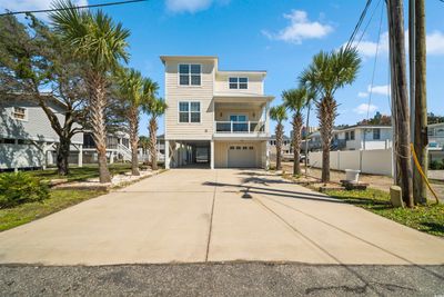 Coastal inspired home with a carport | Image 1