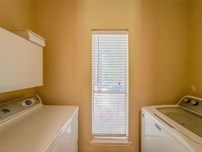 Washroom featuring washer and dryer | Image 14