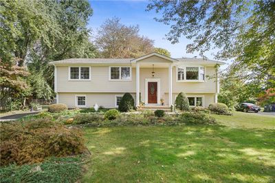 Split foyer home featuring a front lawn | Image 1