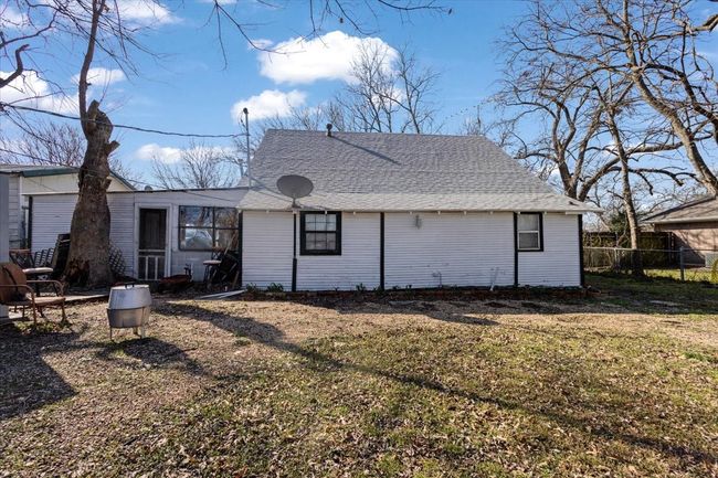 Back of house with a lawn | Image 6